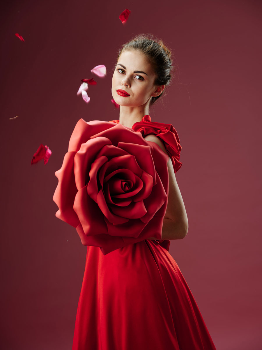 beautiful-young-woman-luxurious-dress-with-roses-rose-petals-stylish-image-red-lipstick