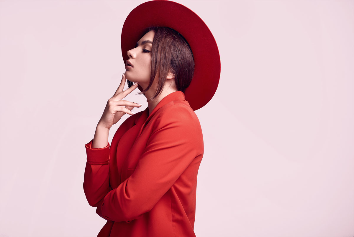 elegant-beautiful-woman-red-fashionable-suit-wide-hat