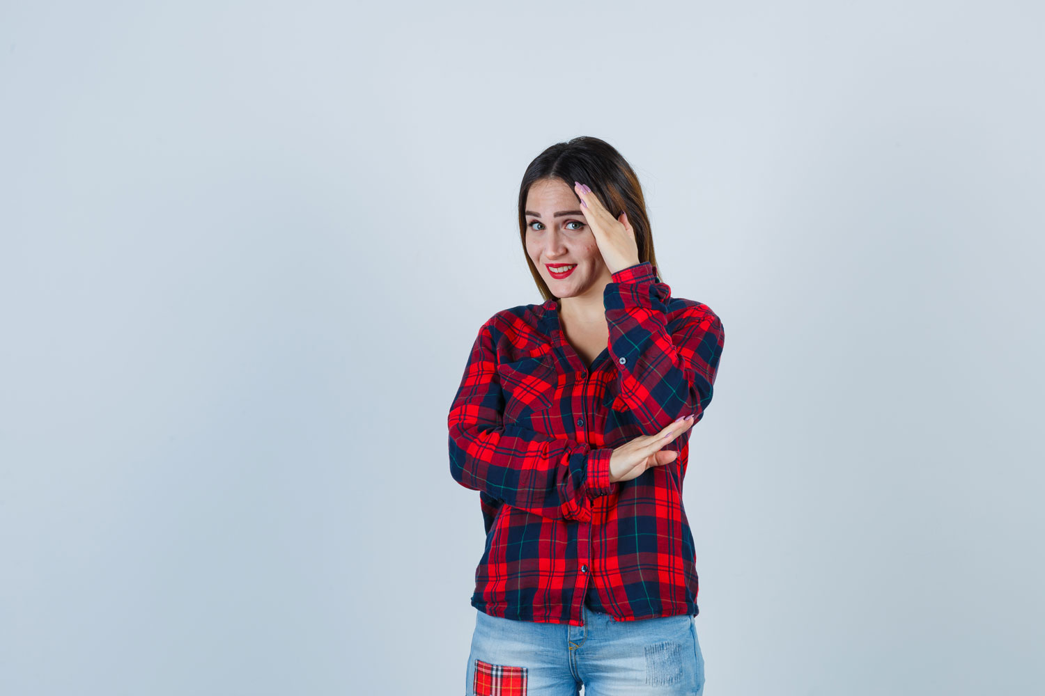 portrait-young-lady-keeping-hand-head-checked-shirt-jeans